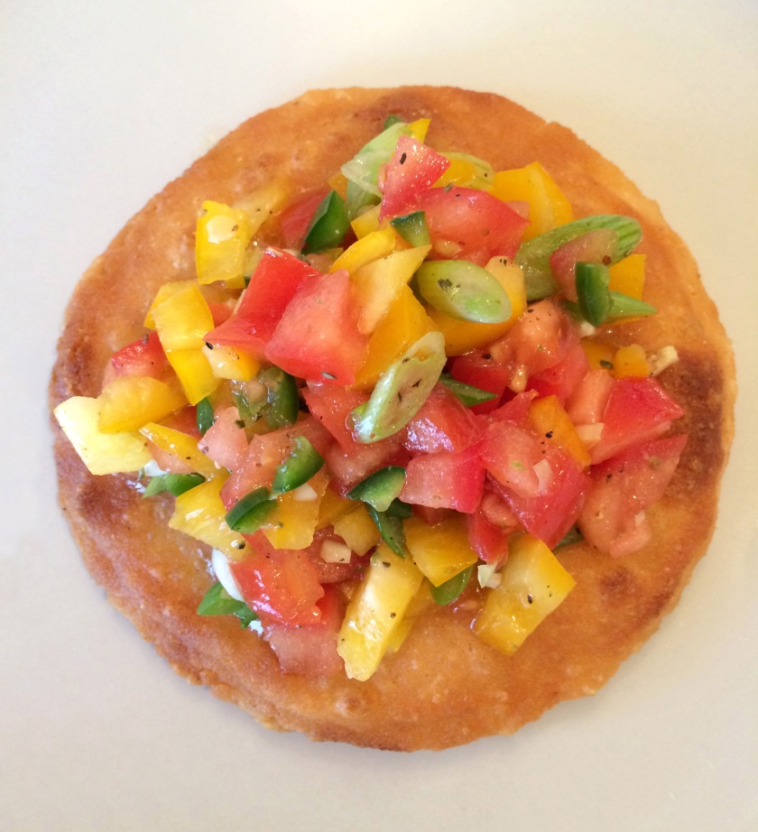 Cheese-filled arepas with tomato and yellow pepper salsa